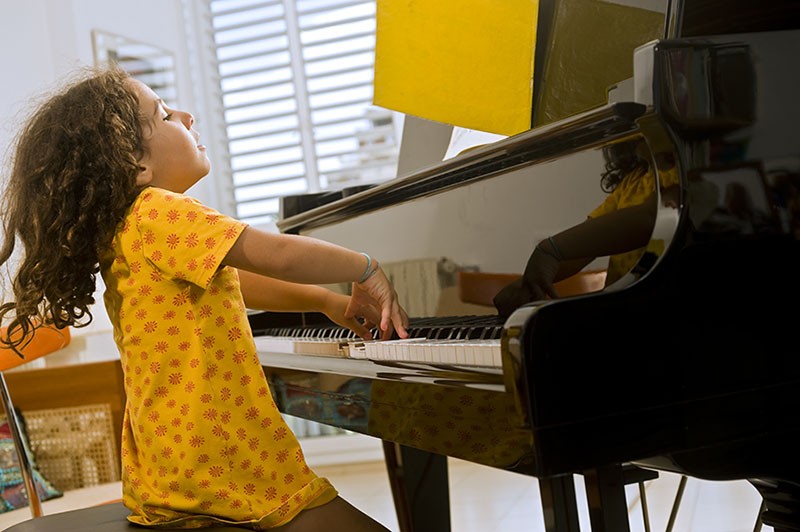 Girl playing the piano